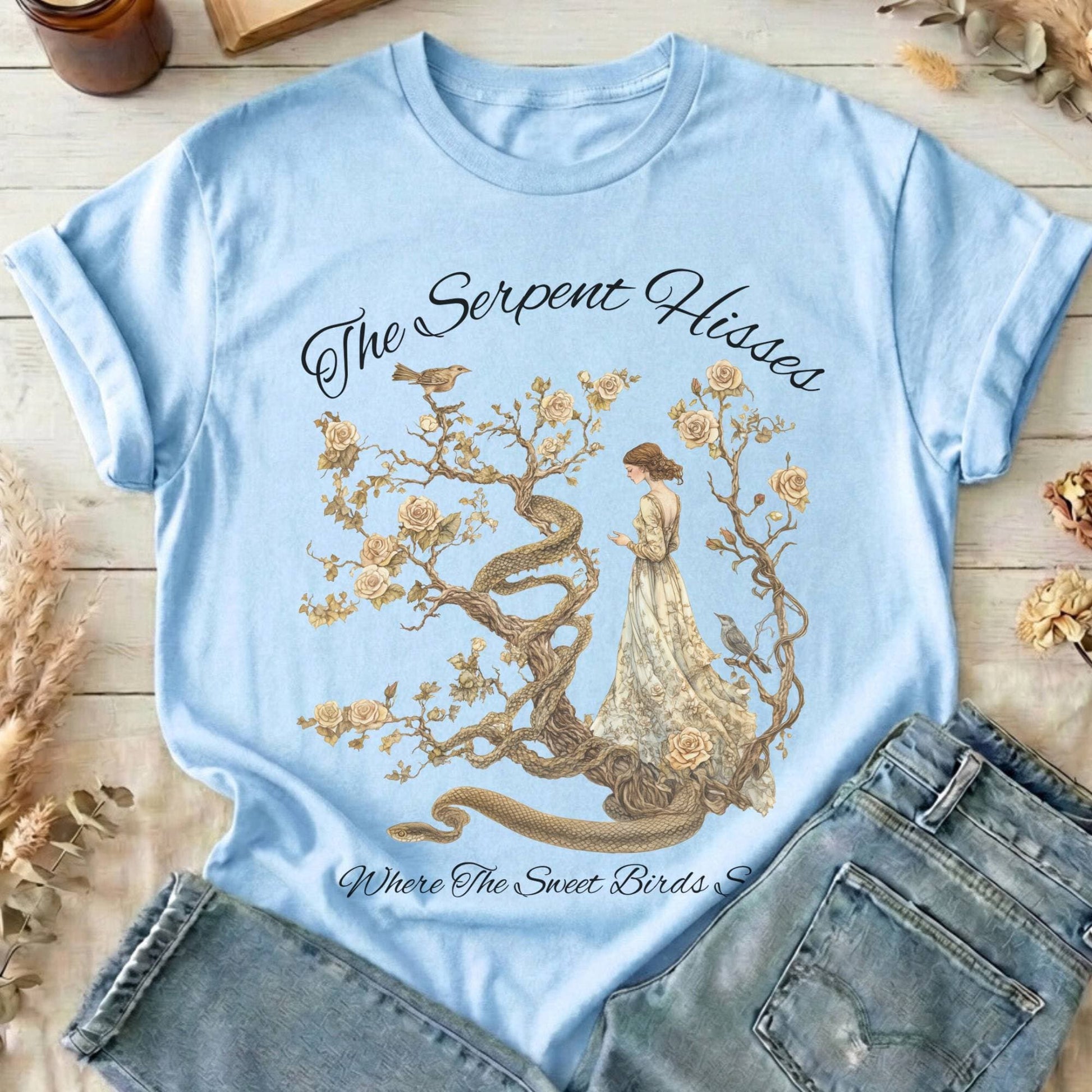 T-Shirt Light Blue / S The Serpent Hisses Where the Sweet Birds Sing T-Shirt The Mystic Eden