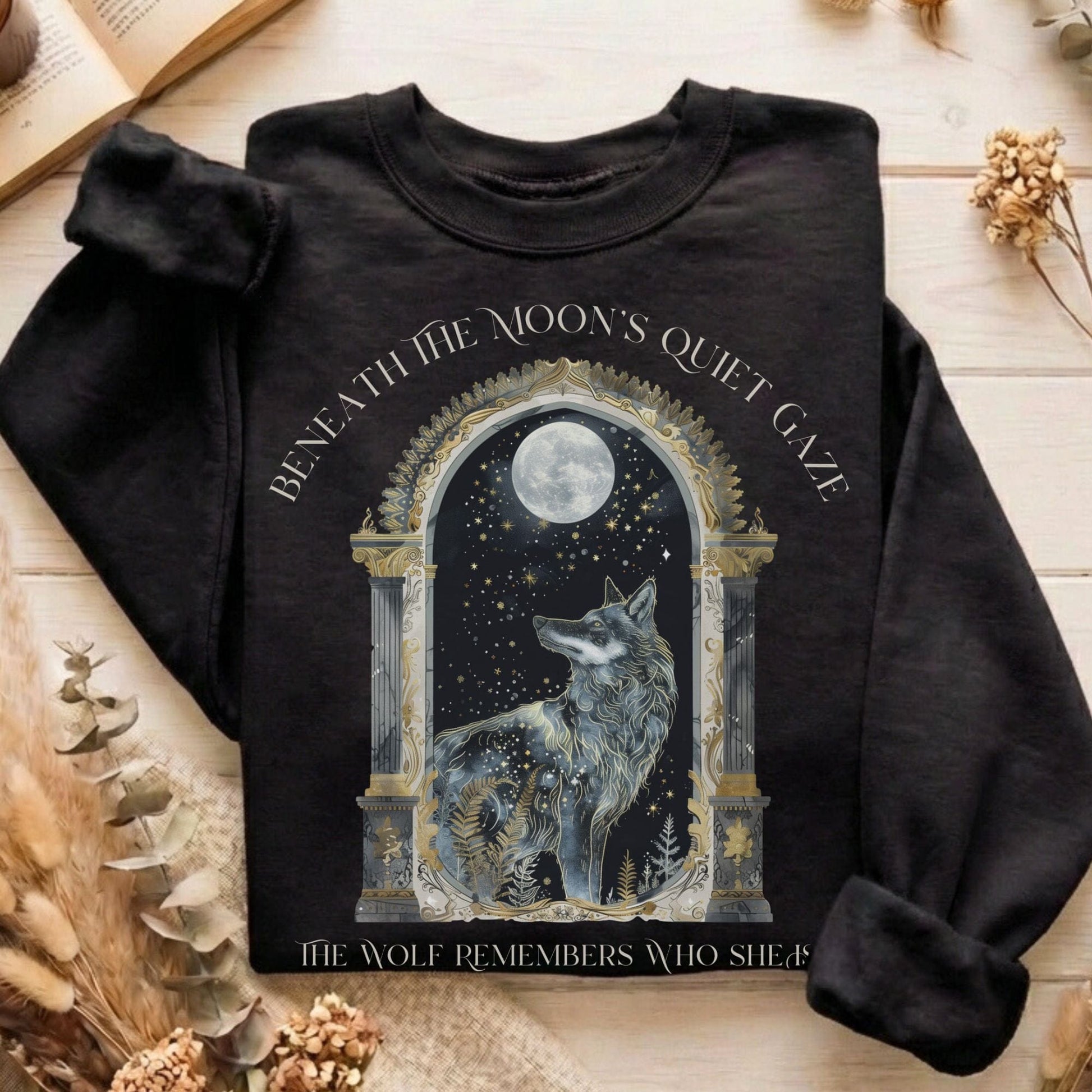 Sweatshirt Black / S Beneath The Moon The Wolf Remembers Who She Is Sweatshirt The Mystic Eden
