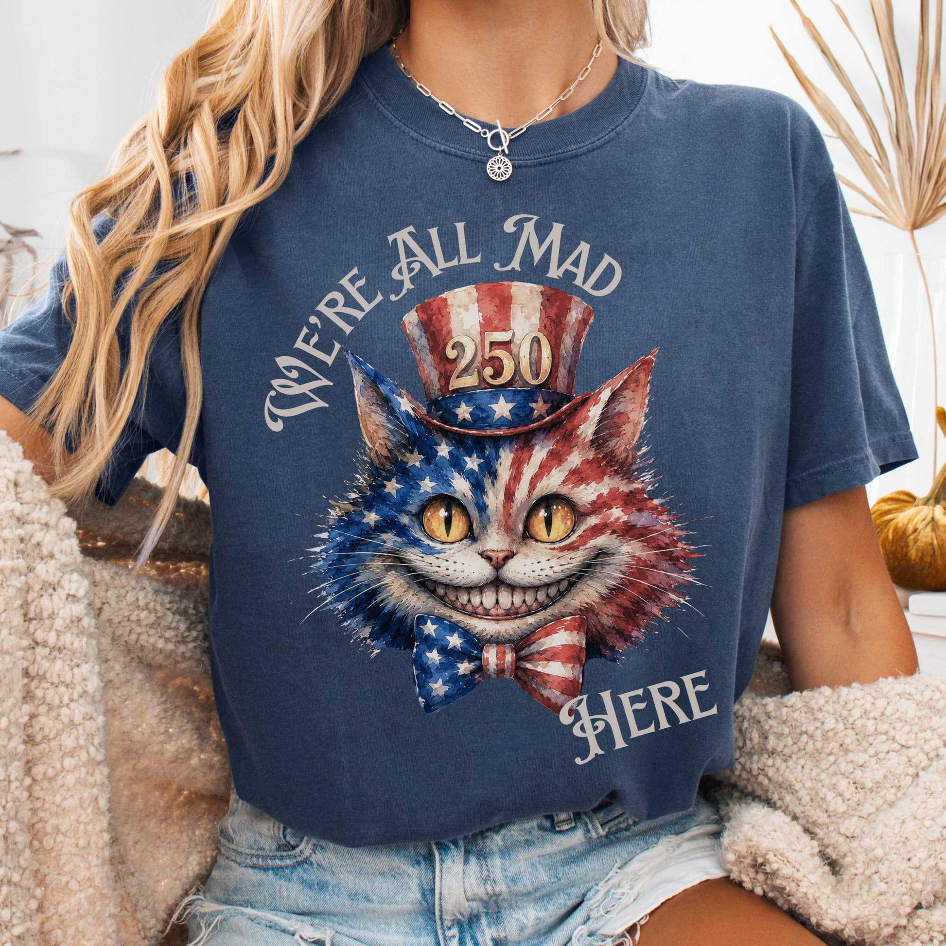 T-Shirt Denim / S We're All Mad Here America 250 Cheshire Cat T-Shirt The Mystic Eden
