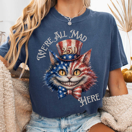 T-Shirt Denim / S We're All Mad Here America 250 Cheshire Cat T-Shirt The Mystic Eden