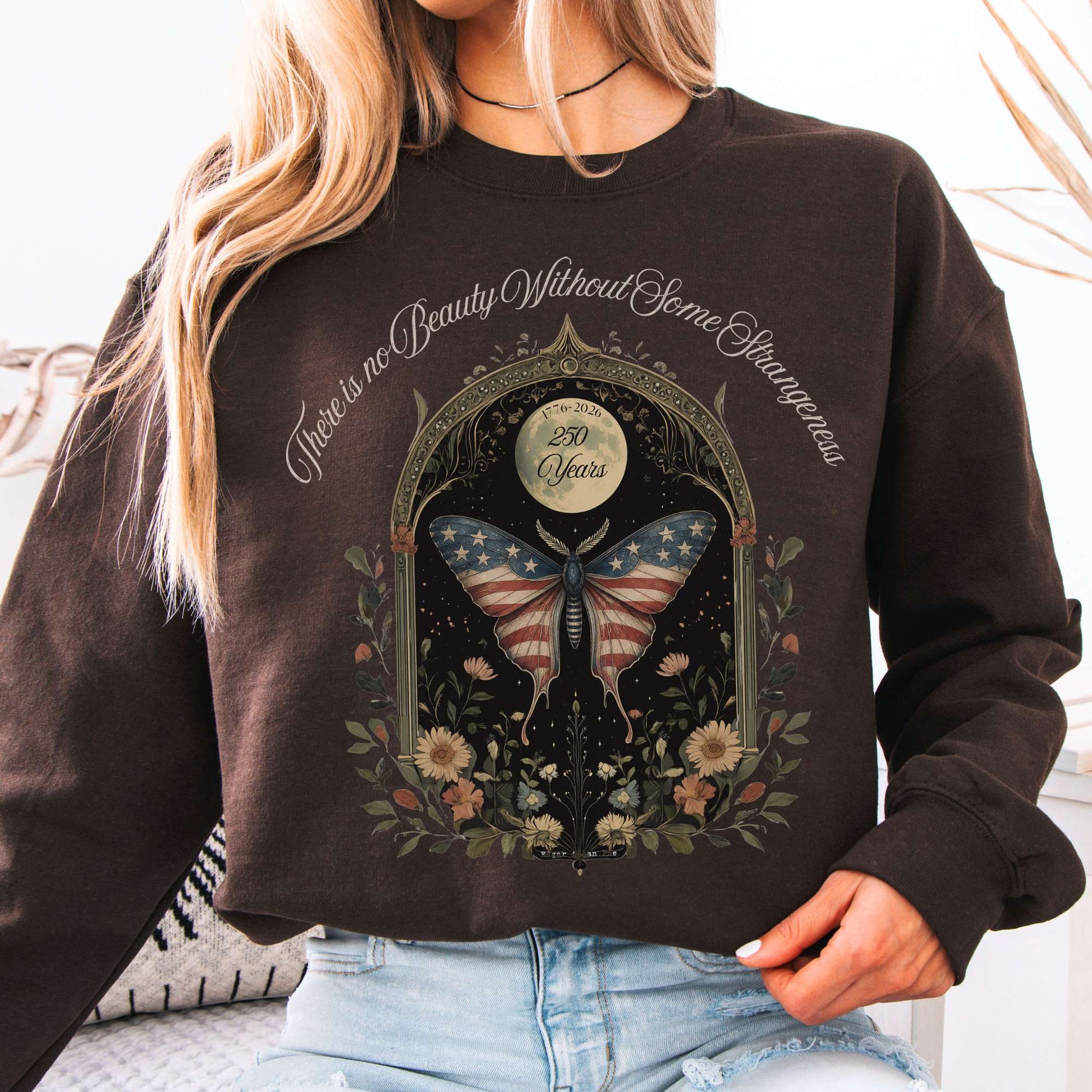 Sweatshirt Dark Chocolate / S There Is No Beauty Without Some Strangeness America 250 Crewneck Sweatshirt The Mystic Eden