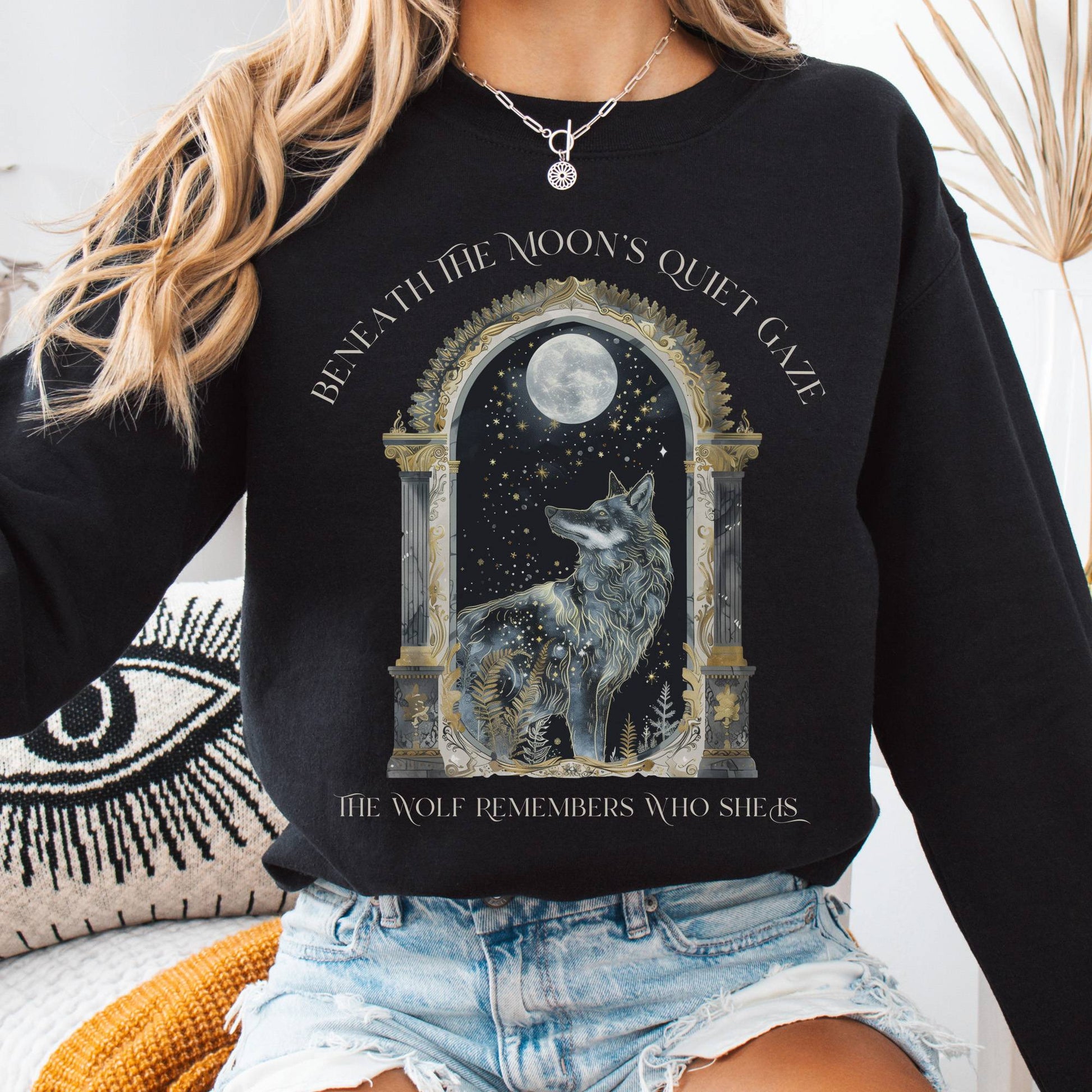 Sweatshirt Black / S Beneath The Moon The Wolf Remembers Who She Is Sweatshirt The Mystic Eden