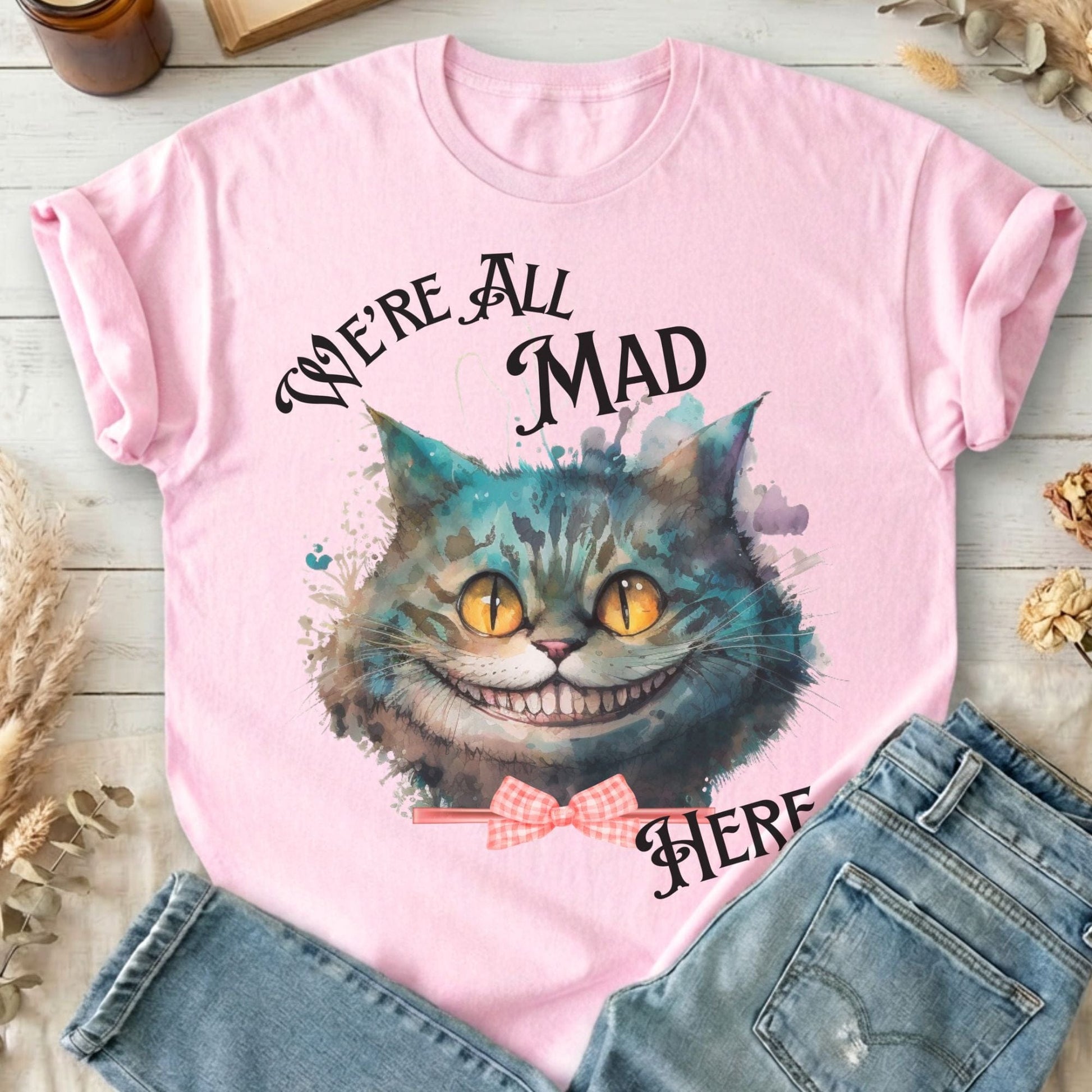 T-Shirt Light Pink / S We're All Mad Here Cheshire Cat T-Shirt The Mystic Eden